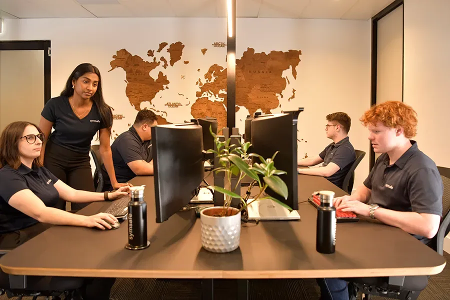 The Symsafe team collaborating in the Sydney office