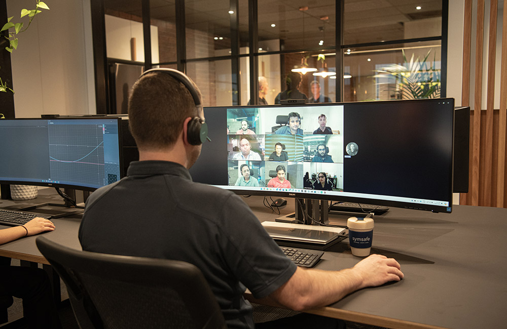 Clients working with a Symsafe BPO team